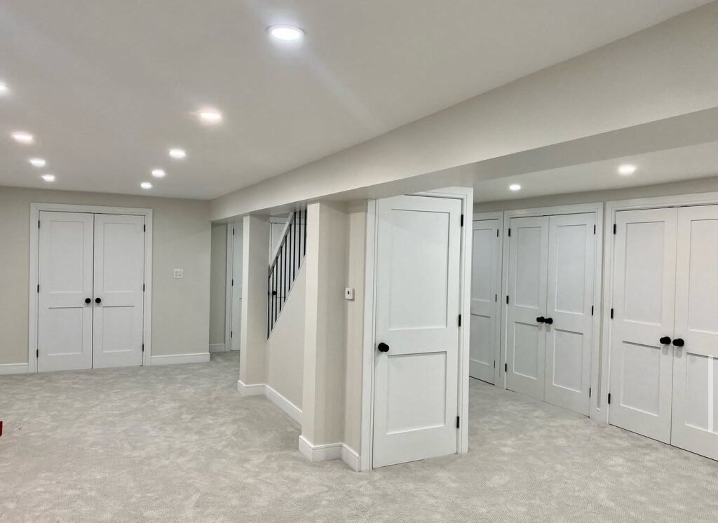 Dacaj Construction crew finishing a white marble kitchen renovation in Westchester County