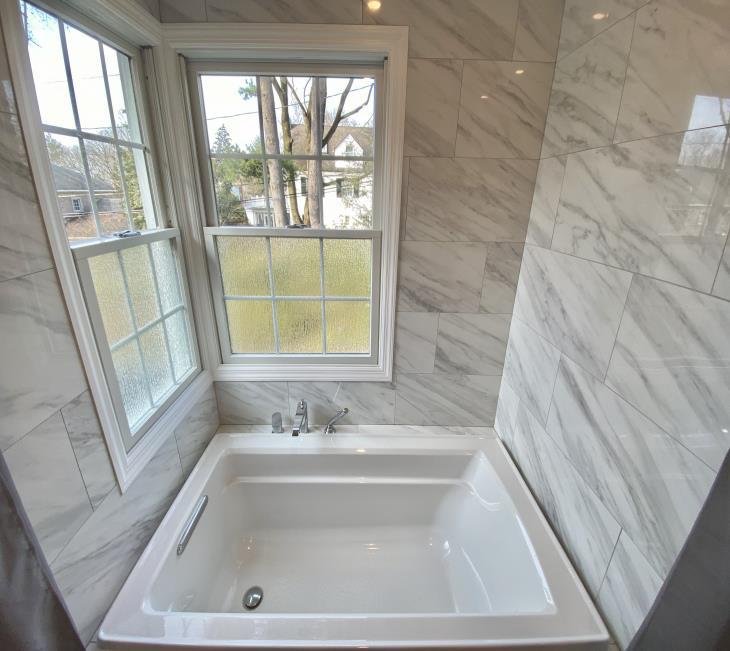 Great Neck home renovation and sunroom addition by Dacaj Construction